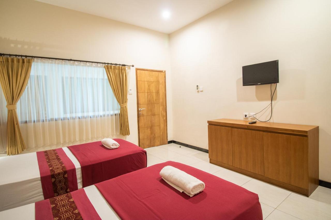 Kuta Suci Guesthouse Exteriér fotografie