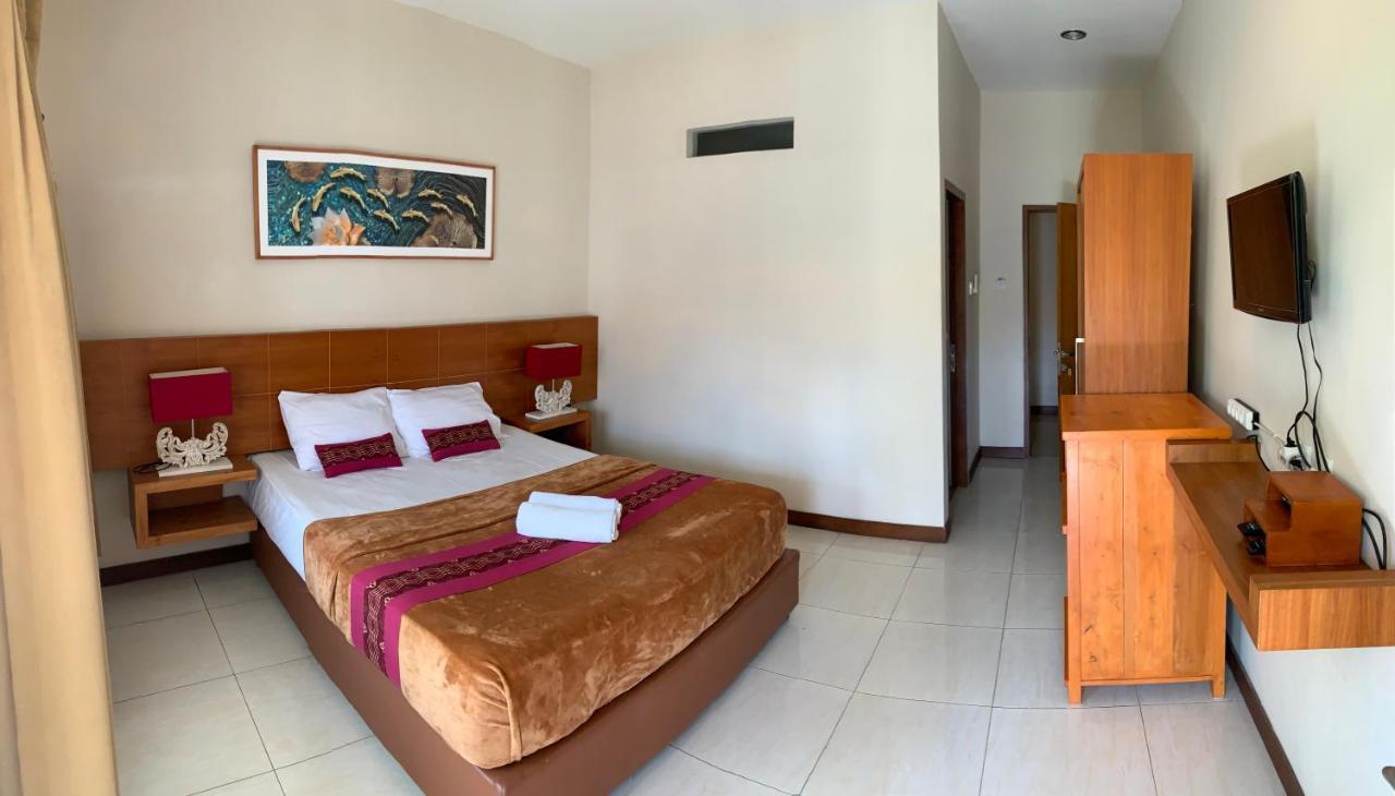 Kuta Suci Guesthouse Exteriér fotografie