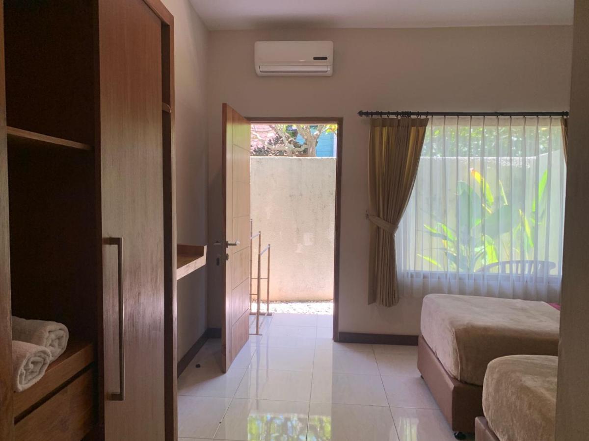 Kuta Suci Guesthouse Exteriér fotografie